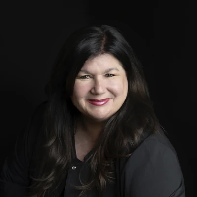 A headshot of Kim a staff member at Johnna Shockley, DMD clinic.